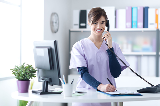image of a receptionist answering the phone